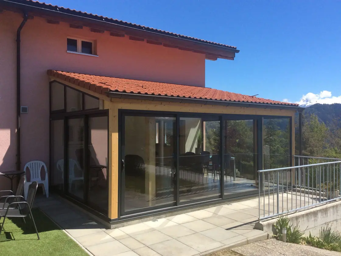 tancament d'alumini terrassa fusta i sostre obra